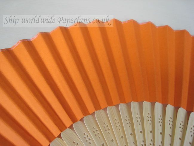 orange paper fan reception wedding decor